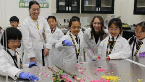 Grade 3 students from Webber Academy explore hands-on experiments during a science field trip at AGAT Laboratories in Calgary