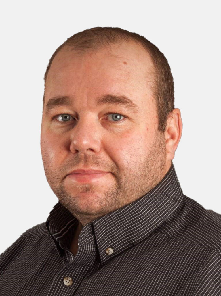 Carter Clarkson, Manager, Technical Services for PVT and Special Core Analysis at AGAT Laboratories, professional headshot.